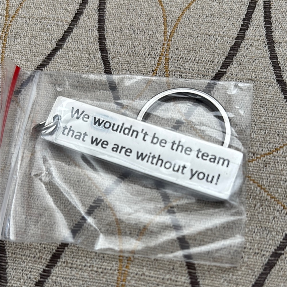 Silver Keychain with Inspirational Quote in English